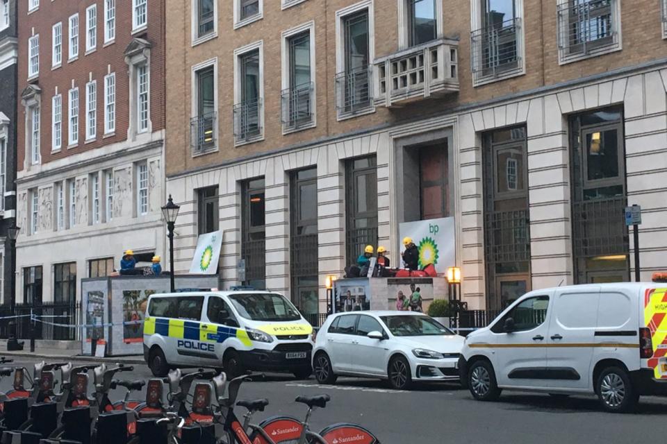 Greenpeace protesters 'shut down' BP's London HQ with blockades weighing 'several' tonnes each 'for fuelling climate emergency'