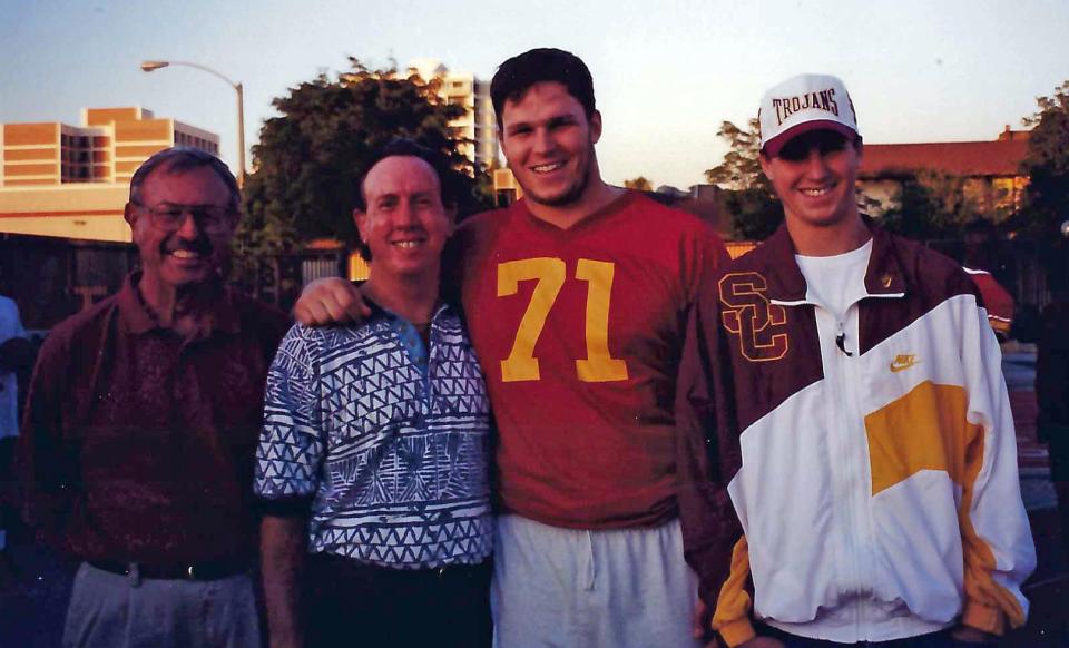 Tony Boselli, second from right, with his arm around his father, Tony Sr., with his Uncle Bud, left, and younger brother Michael Boselli, during his playing days at USC.