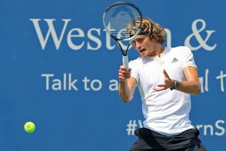 Aug 16, 2017; Mason, OH, USA; Alexander Zverev (GER) returns a shot against Frances Tiafoe (USA) during the Western and Southern Open at the Lindner Family Tennis Center. Mandatory Credit: Aaron Doster-USA TODAY Sports