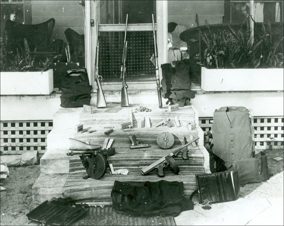 The Ma Barker front porch with weapons seized by the U.S. Justice Department (FBI).