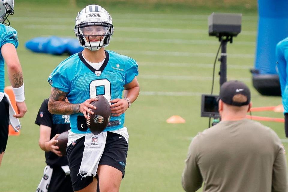 Carolina Panthers quarterback Matt Corral (9) runs drills during rookie minicamp at the Panthers practice field in Charlotte, N.C., Friday, May 13, 2022.