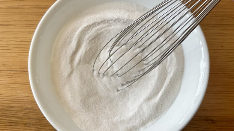 whisking sugar and pectin