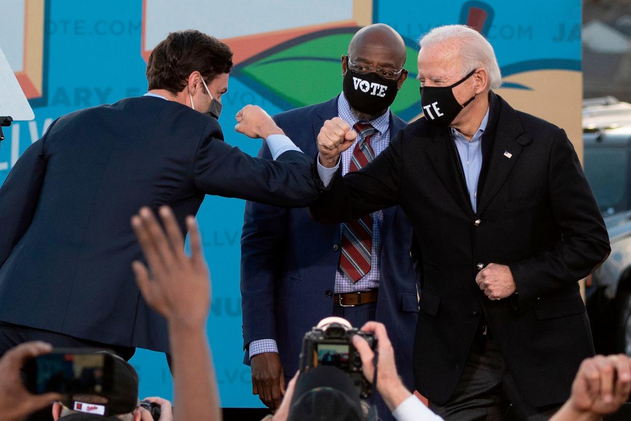 Democrats won back the White House and the Senate thanks to victories by President-elect Joe Biden (right) and Sens.-elect Jon Ossoff (left) and Raphael Warnock (center), but 2020 also showed that the party has plenty of challenges to face.  (Photo: JIM WATSON via Getty Images)