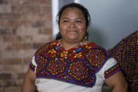 Guatemalan migrant Juana Alonso Santizo arrives at La Aurora international airport in Guatemala City, Sunday, May 22, 2022. Alonso Santizo who was imprisoned in northeastern Mexico for seven years while trying to migrate to the United States and who was arrested on kidnapping charges was released on Saturday, May 21, after numerous organizations and even Mexican President Andres Manuel Lopez Obrador interceded on her behalf. (AP Photo/Moises Castillo)