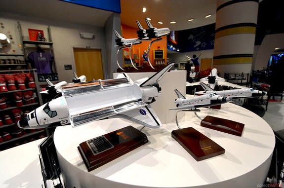 Space shuttle Atlantis models, including a limited edition model signed by Atlantis' final commander Chris Ferguson, are offered by the Kennedy Space Center Visitor Complex in Florida.