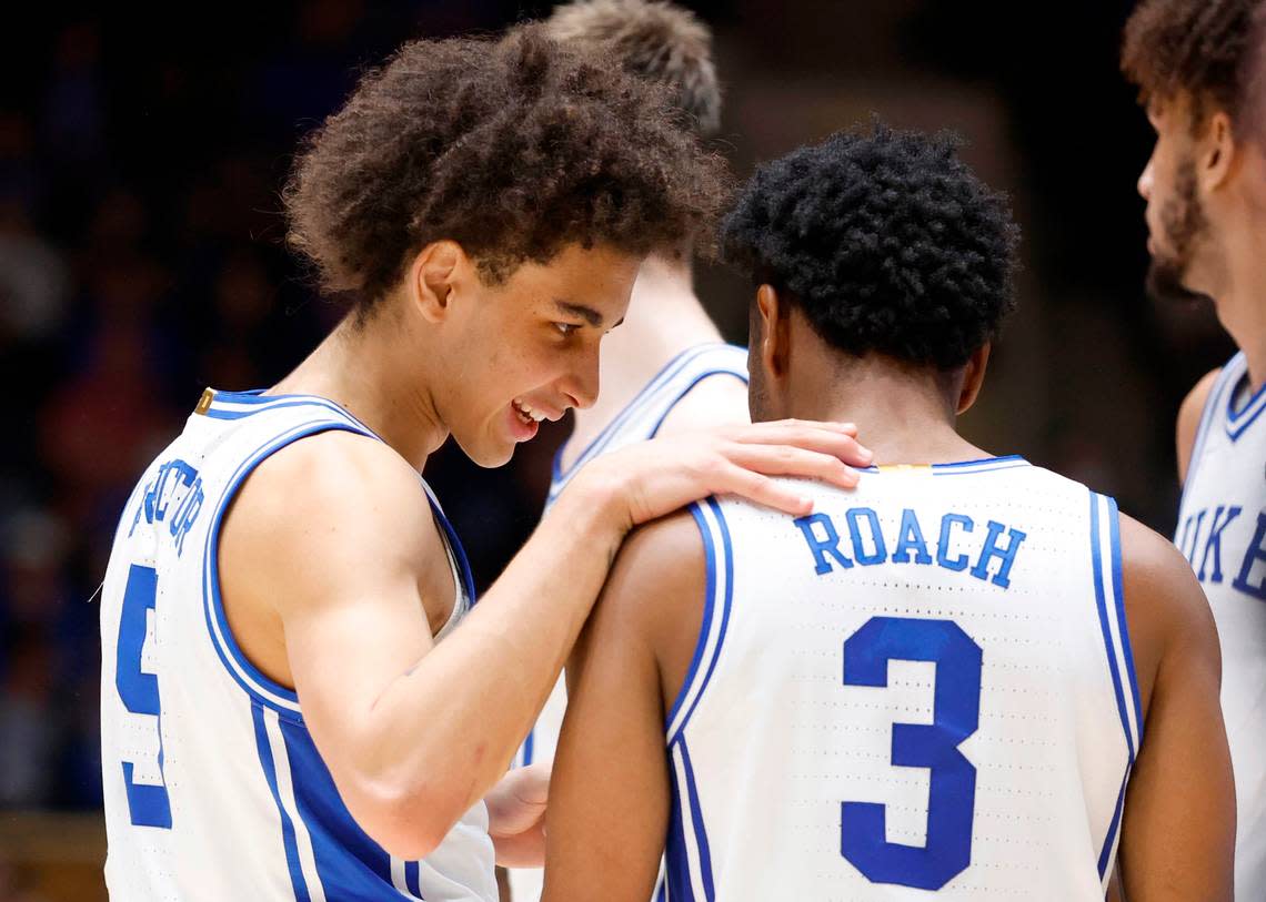 Duke’s Tyrese Proctor (5) talks with Jeremy Roach (3) during the second half of Duke’s 75-73 victory over Wake Forest at Cameron Indoor Stadium in Durham, N.C., Tuesday, Jan. 31, 2023.