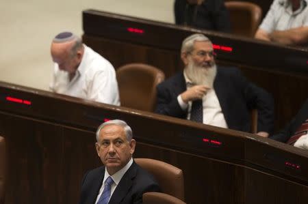 Israel's Prime Minister Benjamin Netanyahu attends the opening of the winter session of the Knesset, the Israeli parliament, in Jerusalem October 27, 2014. REUTERS/Ronen Zvulun