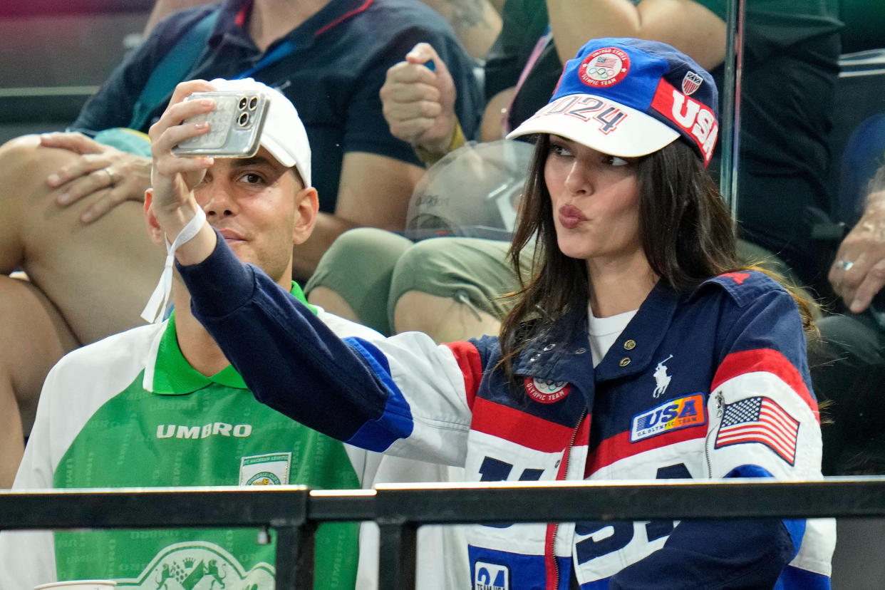 Kendall Jenner takes a selfie in the stands while at the Olympics.