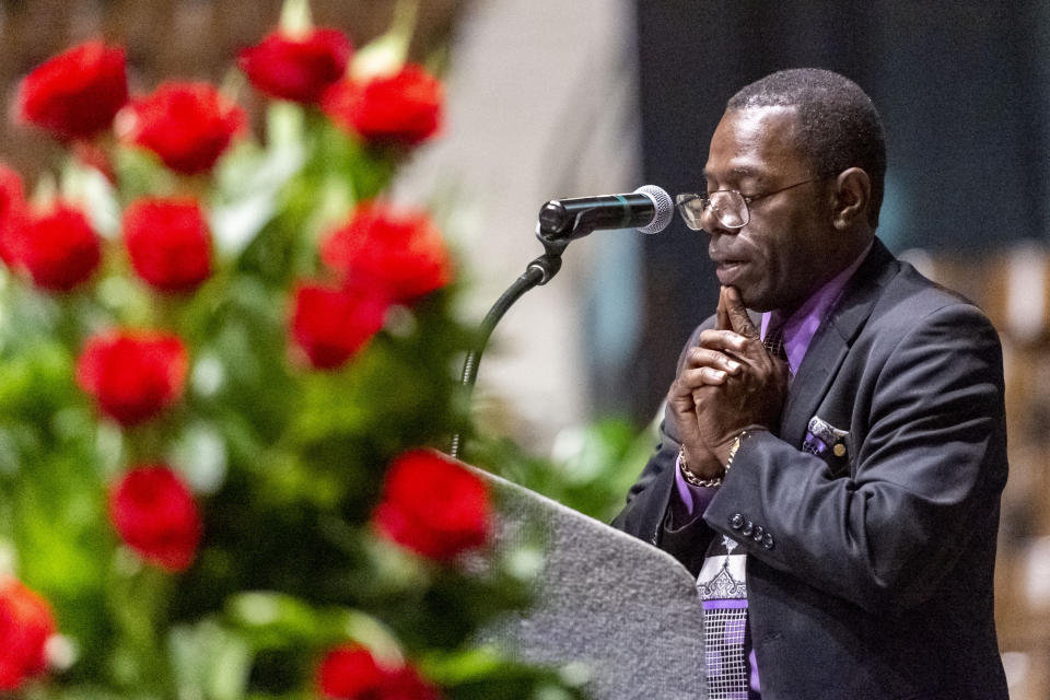 Pastor J. D. Ruffin Jr., of Mars Hill Missionary Baptist Church, gives the eulogy during the memorial service for slain Lowndes County Sheriff "Big John" Williams, Monday, Dec. 2, 2019, in Montgomery, Ala. (AP Photo/Vasha Hunt)