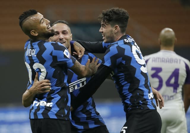 Danilo D’Ambrosio (centre) scored a dramatic late winner at the San Siro