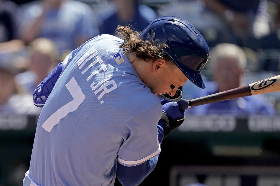 Kansas City Royals' Bobby Witt Jr. reacts after being hit by a pitch thrown by Chicago White Sox starting pitcher Michael Kopech during the first inning of a baseball game Monday, Aug. 22, 2022, in Kansas City, Mo. (AP Photo/Charlie Riedel)