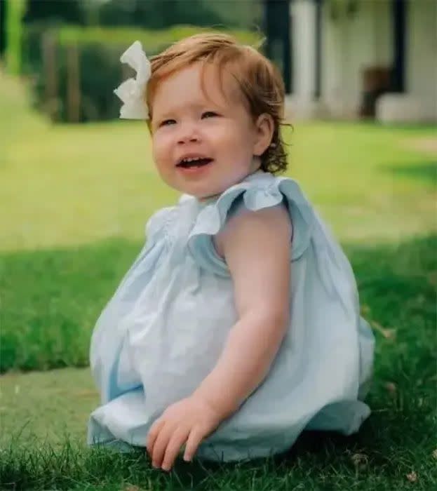 Lilibet Diana posing on the grass for her birthday photo