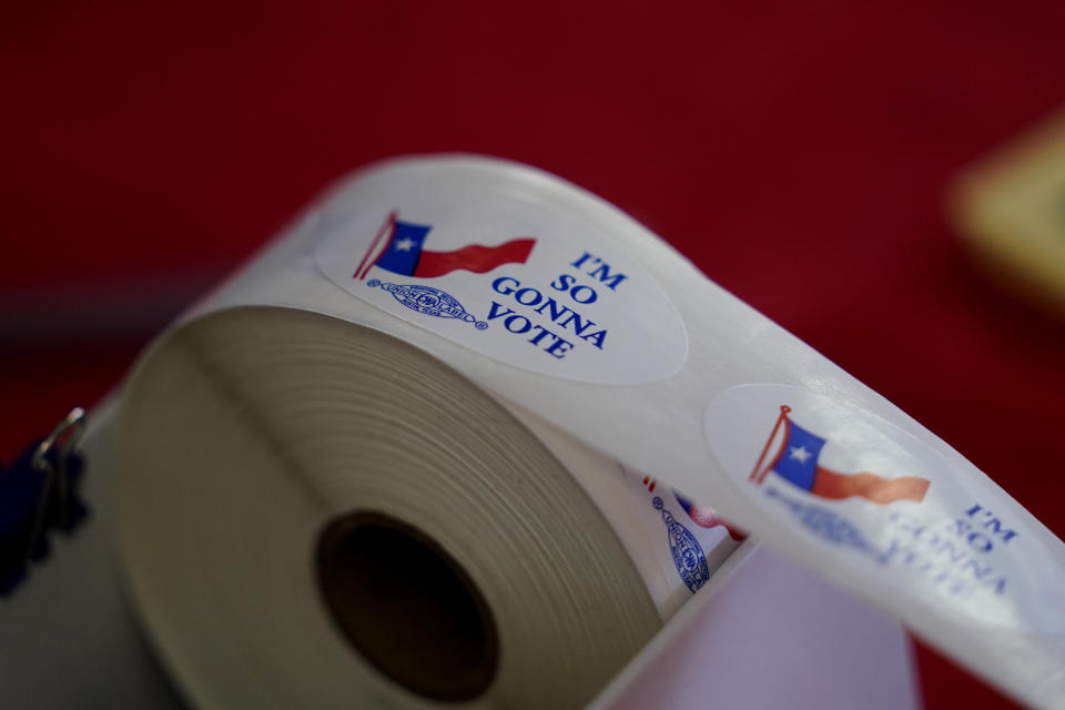 Voting stickers are seen at a political event for Texas Democratic gubernatorial candidate Beto O'Rourke, Wednesday, Aug. 17, 2022, in Fredericksburg, Texas. On the brink of November's midterm elections, both full-time election workers in rural Gillespie County suddenly and stunningly quit this month with less than 70 days before voters start casting ballots. (AP Photo/Eric Gay)