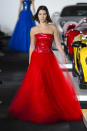 <p><i>Model Bella Hadid wears a strapless, bright crimson ball gown from the SS18 Ralph Lauren collection. (Photo: IMAXtree) </i></p>
