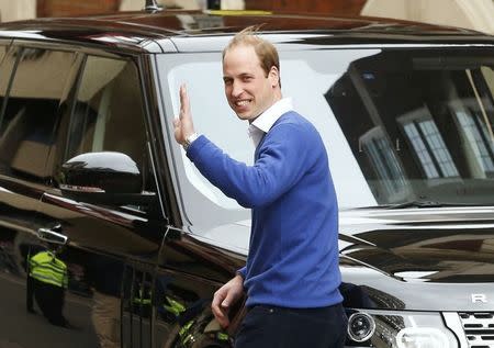 Britain's Prince William waves as he leaves after the birth of his daughter at the Lindo Wing of St Mary's Hospital, in London, Britain May 2, 2015. REUTERS/Cathal McNaughton