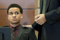 FILE- In this May 11, 2018 file photo attorney Mark Lowry makes his argument on behalf of his client, Zachary Cruz, left, during a hearing at the Broward County Courthouse in Fort Lauderdale, Fla. The younger brother of the Florida school shooting suspect launched an anti-bullying campaign on June 14 saying he witnessed bullying against Nikolas Cruz that may have been a key factor a role in the Feb. 14 massacre at Marjory Stoneman Douglas High School. (Amy Beth Bennett/South Florida Sun-Sentinel via AP, Pool, File)