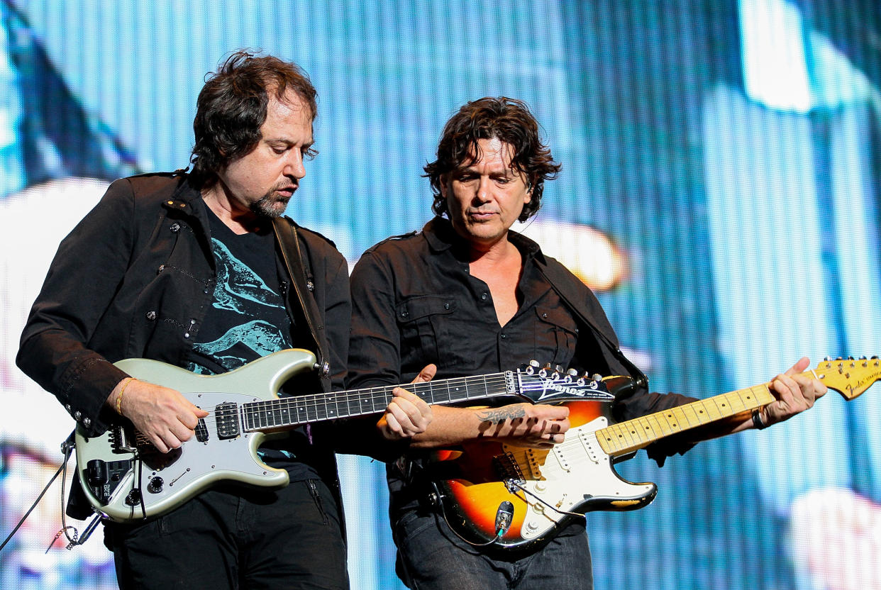 MEXICO CITY, MEXICO - MAY 26:  Guitarrist Alejandro Marcovich and singer Saul Hernandez of Caifanes perform during the Wirikuta Fest 2012 at Foro Sol on May 26, 2012 in Mexico City, Mexico.  (Photo by Victor Chavez/WireImage)