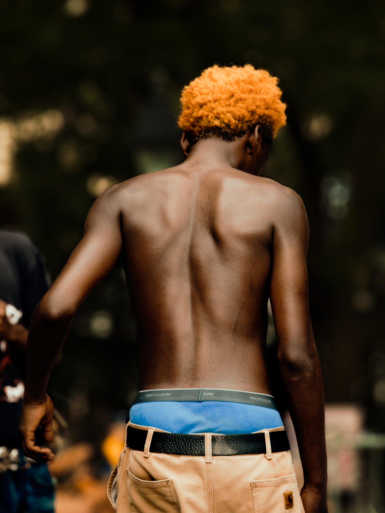 Una persona enseñando piel en el Washington Square Park de Nueva York, el 9 de julio de 2021. (Justin J Wee/The New York Times)