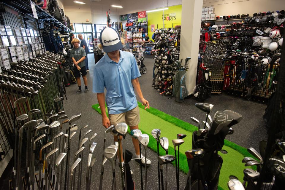 Golf clubs and equipment are just some of the used and new sporting good items customers can purchase at Play It Again Sports, 5331 S.W. 22nd Place.