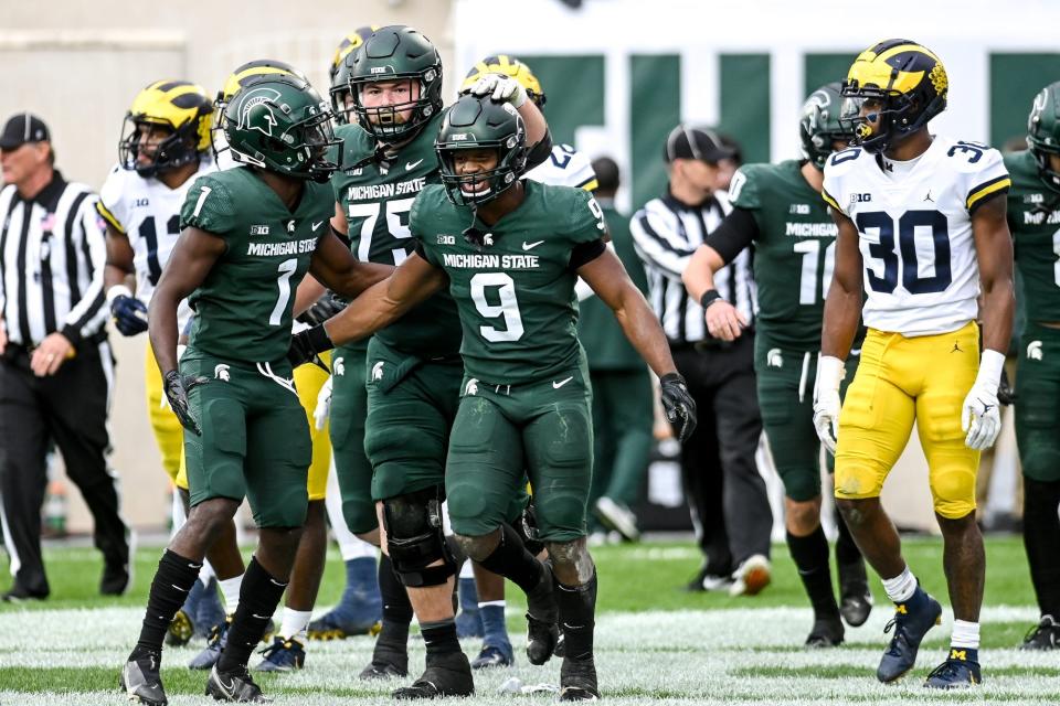 Michigan State's Kenneth Walker III gouged the Michigan defense for 8.6 yards per carry.