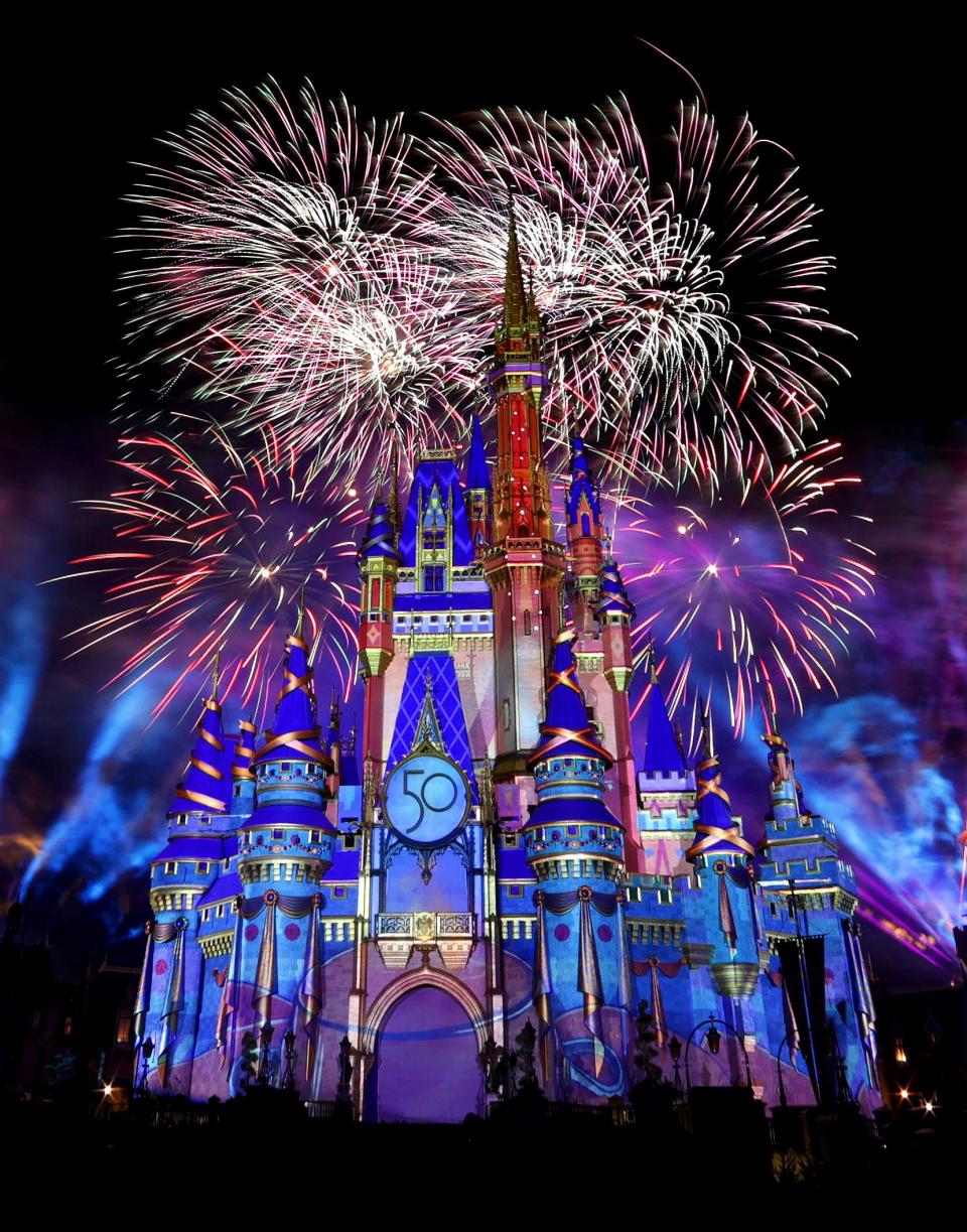 Fireworks launch over Cinderella Castle at the Magic Kingdom marking the 50th anniversary of Walt Disney World, in Lake Buena Vista on Sept. 30, 2021. Even if you’re one of those classy folks who eschew theme parks, it’s hard to resist the allure of Walt Disney World.
