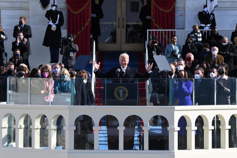President Joe Biden waves to the crowd after being sworn in during the 2021 Presidential Inauguration of President Joe Biden and Vice President Kamala Harris at the U.S. Capitol.
