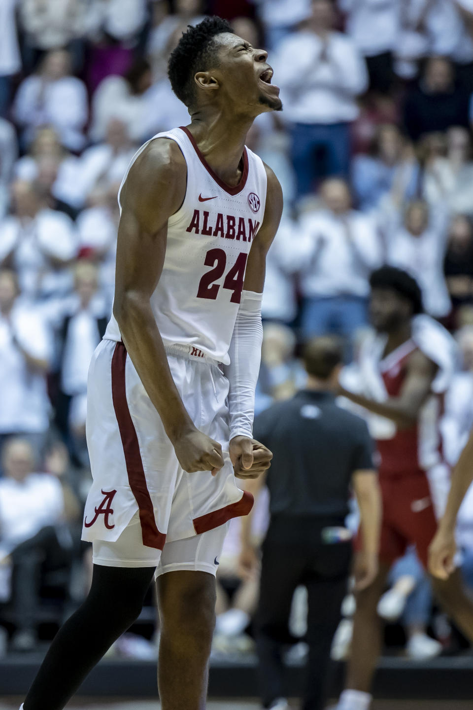 Alabama forward Brandon Miller (24) reacts after a score during the second half of an NCAA college basketball game against Arkansas, Saturday, Feb. 25, 2023, in Tuscaloosa, Ala. (AP Photo/Vasha Hunt)