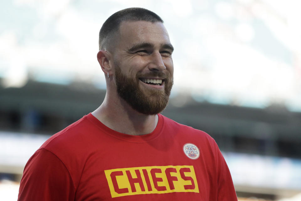 FILE - Kansas City Chiefs' Travis Kelce smiles before the NFL Super Bowl 54 football game between the San Francisco 49ers and Kansas City Chiefs in Miami Gardens Fla., in this Sunday, Feb. 2, 2020, file photo. Seattle's star quarterback Russell Wilson and Kansas City's standout tight end Travis Kelce are among the 32 finalists for the Walter Payton NFL Man of the Year award. (AP Photo/Wilfredo Lee, File)