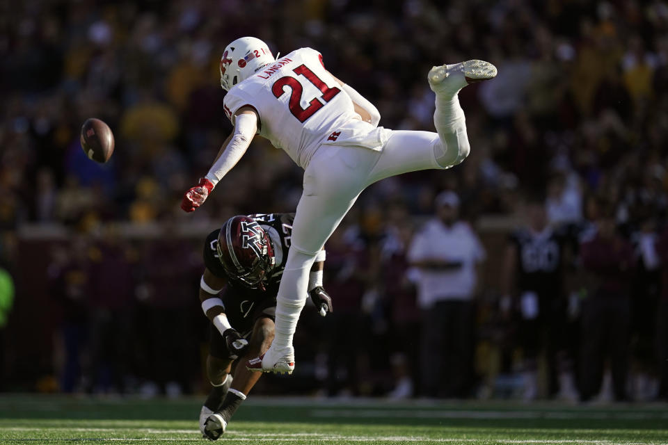 Rutgers tight end Johnny Langan (21) is unable to make a catch as Minnesota defensive back Tyler Nubin (27) defends during the first half of an NCAA college football game Saturday, Oct. 29, 2022, in Minneapolis. (AP Photo/Abbie Parr)