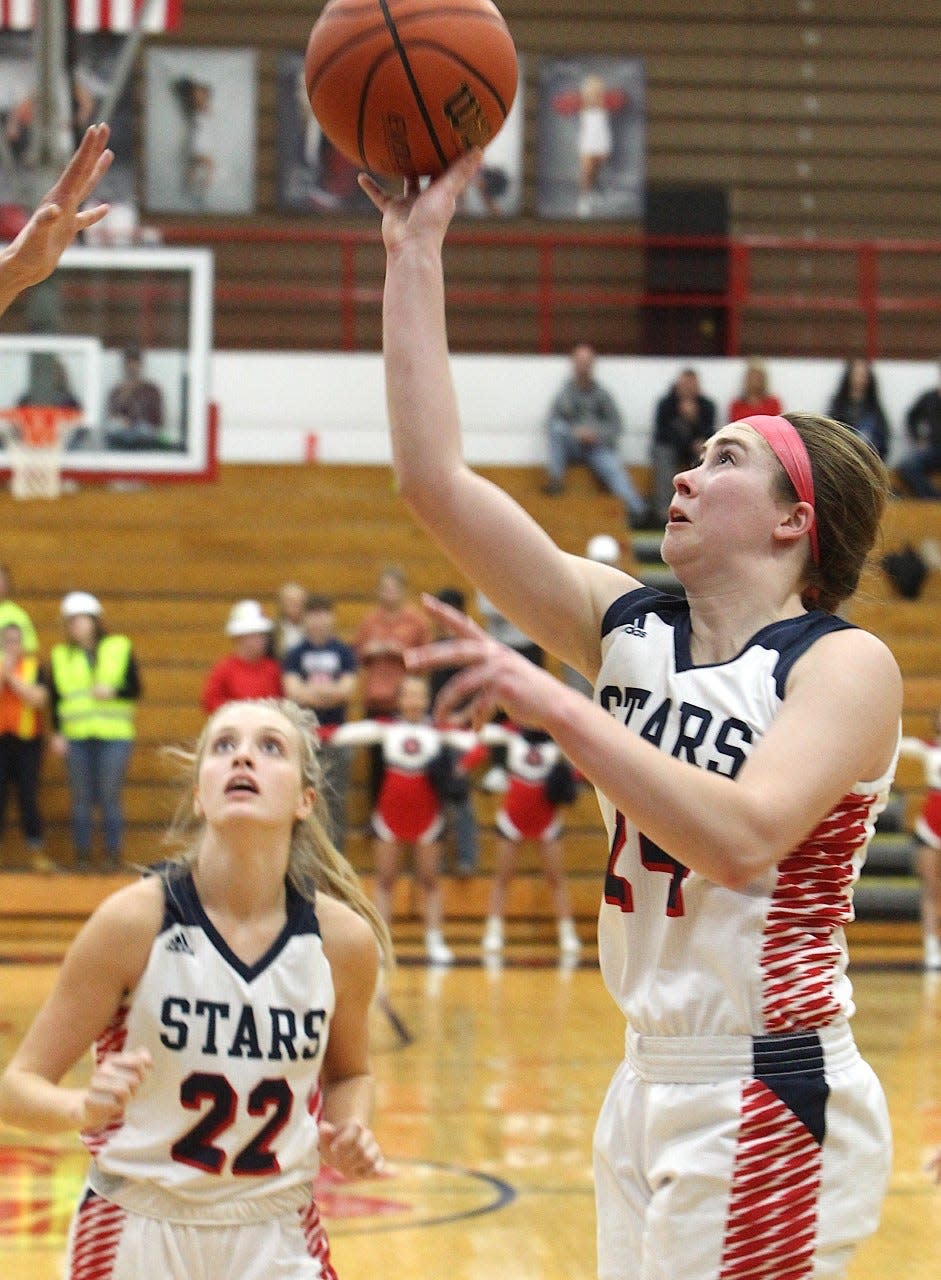 BNL senior Carlee Kern scores inside after taking a nice pass from Mallory Pride (22) Saturday night at BNL Fieldhouse.