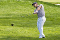 Bryson DeChambeau, of the United States, plays a shot on the fourth hole during the final round of the US Open Golf Championship, Sunday, Sept. 20, 2020, in Mamaroneck, N.Y. (AP Photo/John Minchillo)