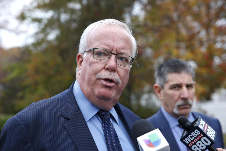 Woodbridge Mayor John McCormac answers questions from media about a Cessna 414 plane that crashed into a home on Tuesday, Oct. 29, 2019, in Woodbridge, N.J. (AP Photo/Noah K. Murray)