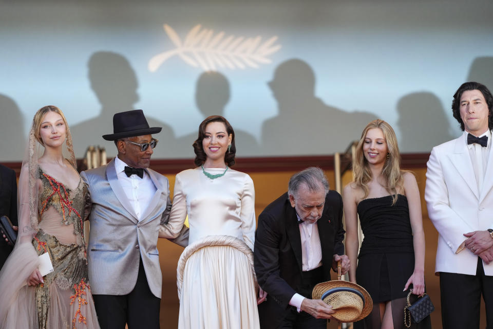 Grace VanderWaal, from left, Giancarlo Esposito, Aubrey Plaza, director Francis Ford Coppola, Romy Mars and Adam Driver pose for photographers upon arrival at the premiere of the film 'Megalopolis' at the 77th international film festival, Cannes, southern France, Thursday, May 16, 2024. (Photo by Scott A Garfitt/Invision/AP)