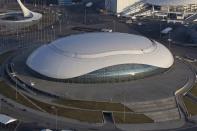 An aerial view from a helicopter shows the "Bolshoy" Ice Dome at the Olympic Park in the Adler district of the Black Sea resort city of Sochi, December 23, 2013. Sochi will host the 2014 Winter Olympic Games in February. Picture taken December 23, 2013. REUTERS/Maxim Shemetov (RUSSIA - Tags: CITYSCAPE BUSINESS CONSTRUCTION SPORT OLYMPICS)