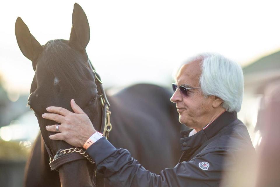 Trainer Bob Baffert checks in with Medina Spirit outside his barn at Churchill Downs the morning after winning the Kentucky Derby last May. Eight days after the race, Baffert announced the colt failed his postrace drug test.