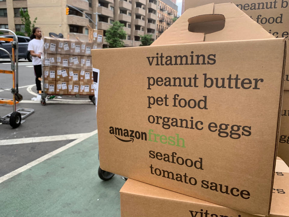 In this Sunday, June 16, 2019, boxes of Amazon Fresh deliveries are unloaded in New York. If you aren’t already tracking your spending, do so. Pay close attention to all the payments you make _ recurring or not _ and to the forms of payment: credit cards, Venmo, etc. Subscription services are attractive because they’re easy to sign up for and come with minimal monthly financial commitment, said researcher Dhaval Moogimane. But small costs can add up, and prices can increase over time.(AP Photo/Jenny Kane)