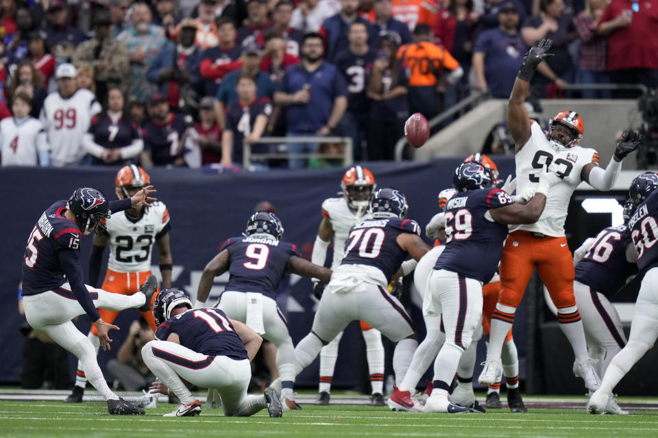 Houston Texans place-kicker Ka'imi Fairbairn kicks a field goal against the Cleveland Browns during the first half of an NFL wild-card playoff football game Saturday, Jan. 13, 2024, in Houston. (AP Photo/Eric Christian Smith)