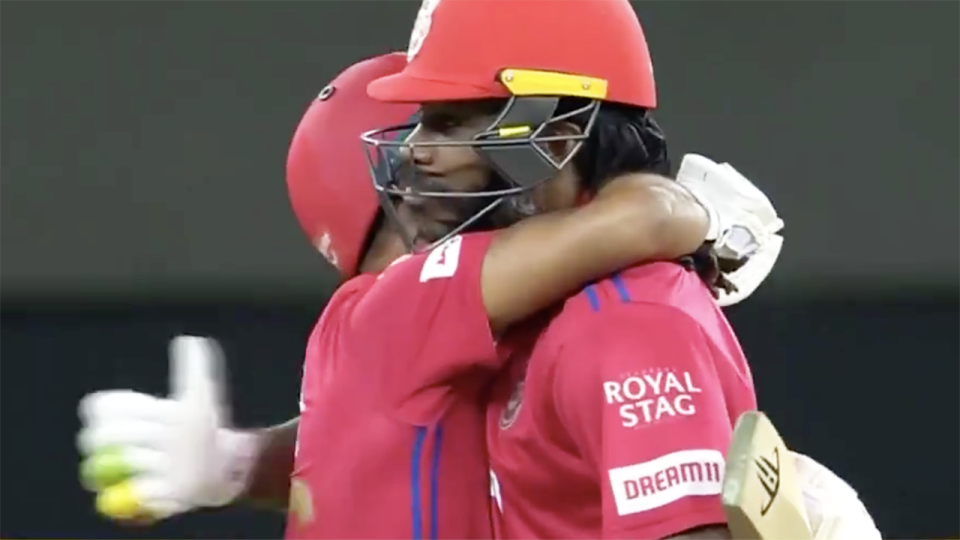 Kings XI Punjab batsmen Chris Gayle and Mayank Agarwal embrace after hitting the winning runs in the second super over against the Mumbai Indians in the IPL over the weekend. Picture: Sky Sports Cricket