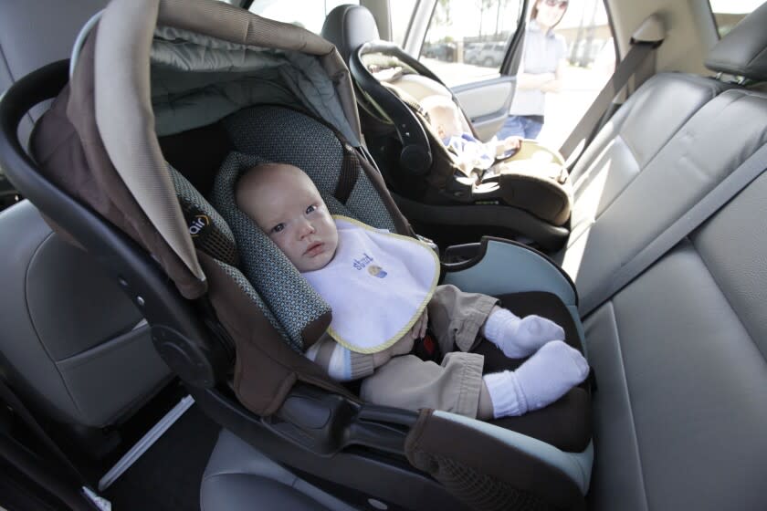 An infant sits in a rear facing car seat at the grand opening of the Dorel Juvenile Group Car Seat Inspection Station in Columbus, Ind. Thursday, April 28, 2011. The newly opened station provides families with car seat education and installation. (AJ Mast / AP Images for Dorel Juvenile Group)