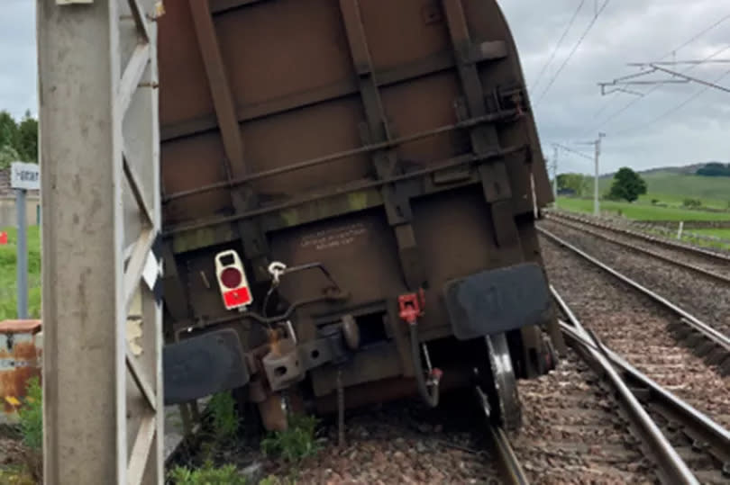 The derailed freight train