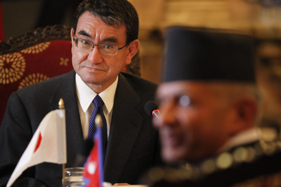 Japanese Foreign Minister Taro Kono, left and Nepalese Minister for Foreign Affairs Pradeep Gyawali sit during a bilateral meeting in Kathmandu, Nepal, Wednesday, Jan. 9, 2019. (AP Photo/Niranjan Shrestha)