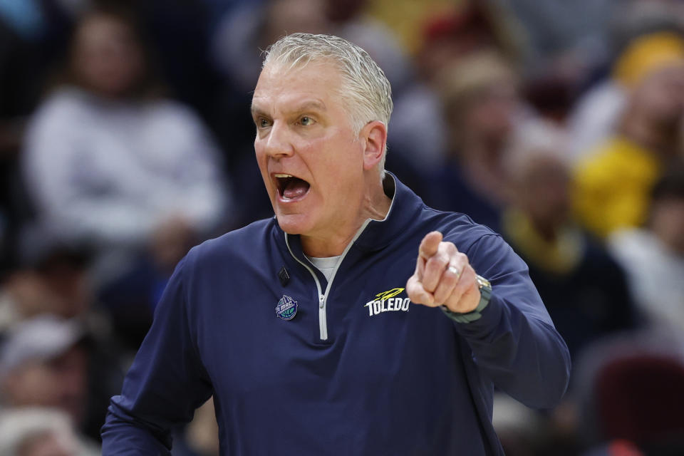 Toledo head coach Tod Kowalczyk argues a call during the first half of an NCAA college basketball game against Kent State for the championship of the Mid-American Conference Tournament, Saturday, March 11, 2023, in Cleveland. (AP Photo/Ron Schwane)