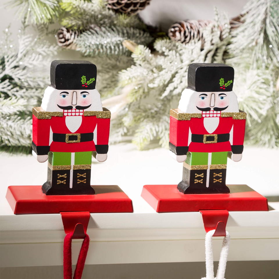 <p><a href="https://go.redirectingat.com?id=74968X1596630&url=https%3A%2F%2Fwww.walmart.com%2Fip%2FGlitzhome-Wooden-Metal-Nutcracker-Xmas-Stocking-Holder-Set-of-2%2F859866131&sref=https%3A%2F%2Fwww.thepioneerwoman.com%2Fholidays-celebrations%2Fg45211938%2Fwalmart-christmas-decorations%2F" rel="nofollow noopener" target="_blank" data-ylk="slk:Shop Now;elm:context_link;itc:0;sec:content-canvas" class="link ">Shop Now</a></p><p>Nutcracker Stocking Holder Set of 2</p><p>walmart.com</p><p>$34.99</p><span class="copyright">Walmart</span>