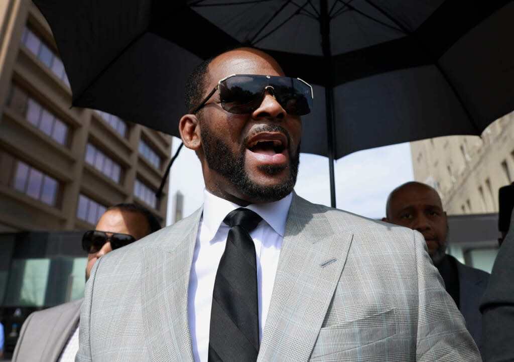 R&B singer R. Kelly leaves the Leighton Criminal Court Building in Chicago on June 6, 2019. A federal judge signaled Wednesday that she plans to order disgraced R&B superstar R. Kelly to pay more than $300,000 to one of his victims. (AP Photo/Amr Alfiky, File)