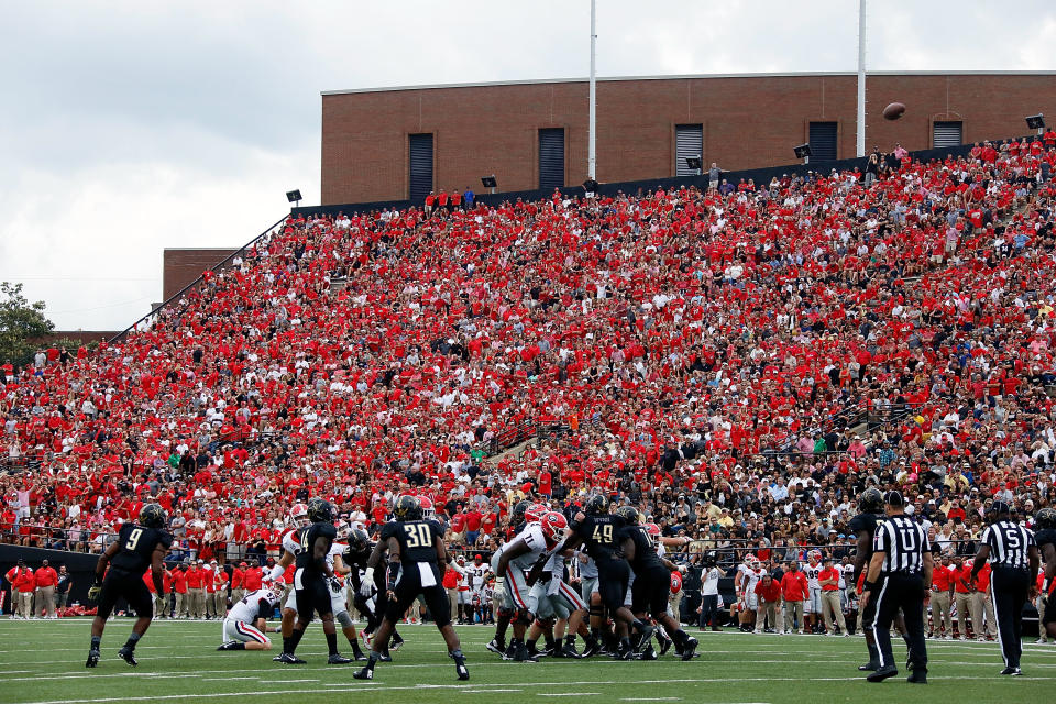 Hundreds of fans of the Georgia Bulldogs cheer during the second half of a game against the Vanderbilt Commodores at Vanderbilt Stadium on October 7, 2017 in Nashville, Tennessee. (Photo by Frederick Breedon/Getty Images)