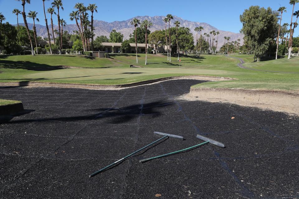 A black-rubberized liner is showing in a bunker on the 8th hole of the Lagos course at Desert Princess because of a shortage of bunker sand in Cathedral City, Calif., September 19, 2022. 