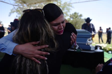 Friends and family gather for a funeral, six days after a mass shooting in El Paso