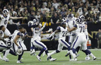 Los Angeles Rams players celebrate after overtime of the NFL football NFC championship game against the New Orleans Saints, Sunday, Jan. 20, 2019, in New Orleans. (AP Photo/David J. Phillip)