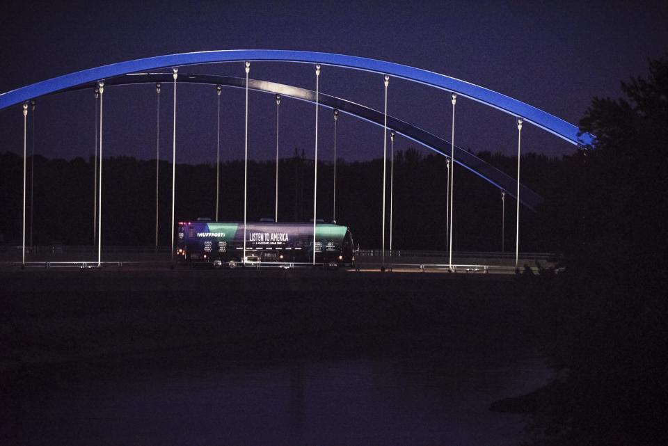 The HuffPost tour bus&nbsp;driving at night during its stop in Iowa.&nbsp;