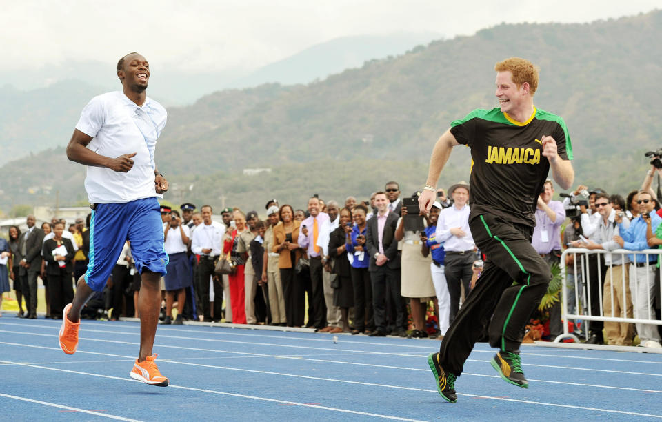 Prince Harry is first out of the blocks against Olympic sprint champion Usain Bolt, at the University of the West Indies, in Jamaica where the Prince arrived late yesterday afternoon from The Bahamas.